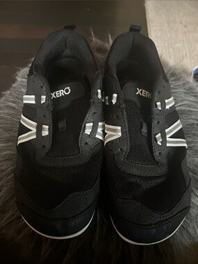 Xero Men’s Black Slip-On Athletic Shoes with Reflective Accents